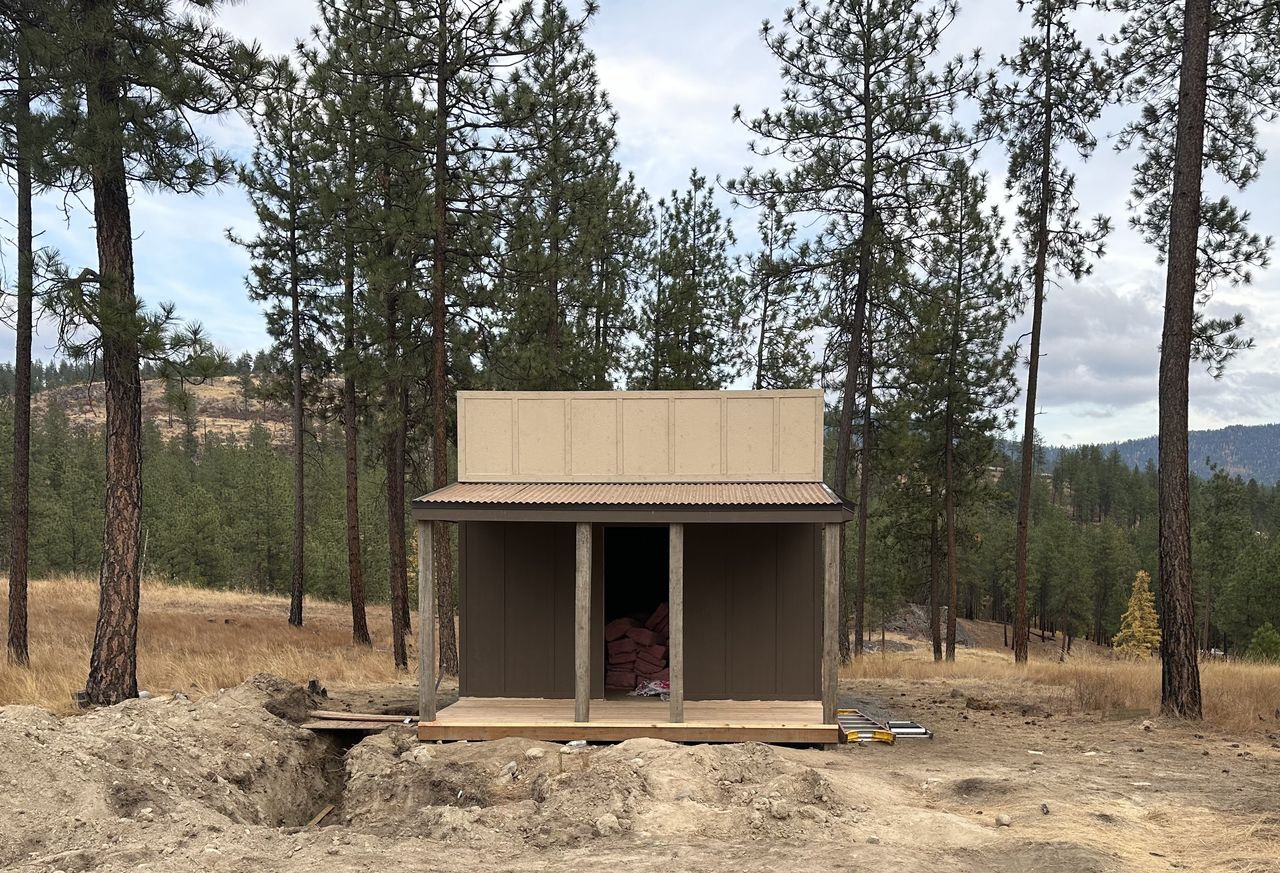A custom-built timber saloon outbuilding constructed on a permanent, poured concrete structural foundation.